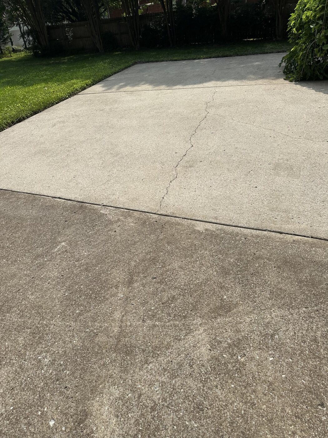 Driveway with a clear clean and unclean comparison